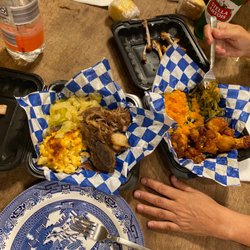 Jeffrey Youmans - Our wings, cabbage, mac n cheese, short ribs candied yams, green beans. TASTY!