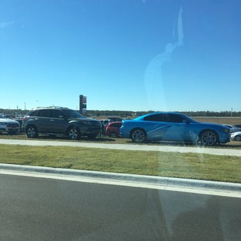 Tanger Outlets Daytona Beach - Nowhere to park- parking on grass - Outlet Stores Near Me - Daytona Beach, Florida