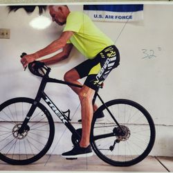 Tom's Pro Bike - Before bike fit and after correcting the 'Pro' fit saddle height.