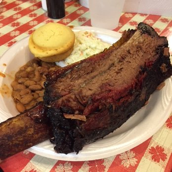 Black's Barbecue Lockhart - Beef Rib before eating - with Cole Slaw, Pinto Beans, and Corn Bread - Barbeque Near Me - Lockhart, Texas Black's Barbecue Lockhart - Beef Rib before eating - with Cole Slaw, Pinto Beans, and Corn Bread - Barbeque Near Me - Lockhart, Texas