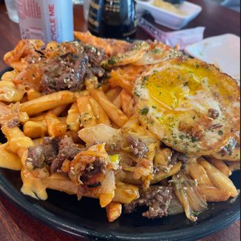 Soho Ramen and Sake Bar - Beef Kimchi Fries with a Sunny Side up Egg - Ramen Near Me - Temecula, California Soho Ramen and Sake Bar - Beef Kimchi Fries with a Sunny Side up Egg - Ramen Near Me - Temecula, California