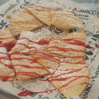 Bubbakoo's Burritos - Love chips, fried dough with powdered sugar, and drizzled caramel/raspberry syrup. - Mexican Near Me - Miramar, Florida
