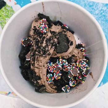 Menchie's Frozen Yogurt - a bowl of ice cream with chocolate and sprinkles - Ice Cream & Frozen Yogurt Near Me - Gainesville, Florida