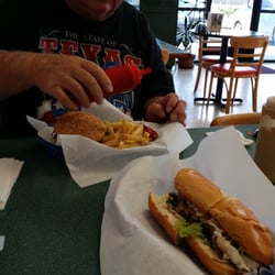 Famous George's Cafe - Really smells yummy...Sid got his usual burger, I got the ribeye steak sandwich.  Gotta eat...smell is awesome!