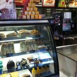McDonald's - Pix of McCafe items and regular menu board behind.  Meat Pies!