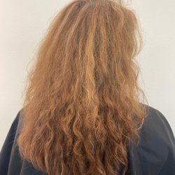 Collective Curl Salon and Suites - This is a before picture of a new guest that came in to learn about her curls and to find products that fit best for her hair
