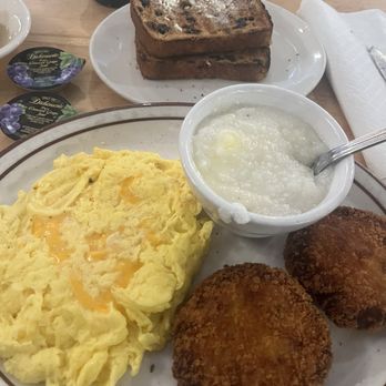 Grady's Snack N' Dine - Salmon croquettes , grits (salt no sugar like it should be Lol) and eggs and raisin bread toast ...decaf coffee and a water w/lemon - Diners Near Me - Homewood, Illinois