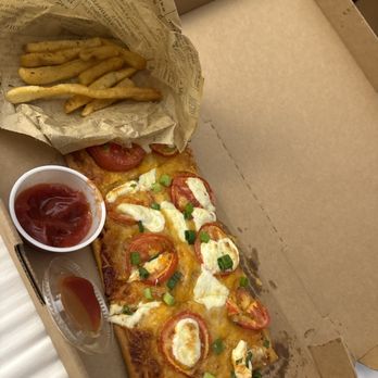 Erling Jensen Small Bites - Marg pizza and fries - New American Near Me - Memphis, Tennessee Erling Jensen Small Bites - Marg pizza and fries - New American Near Me - Memphis, Tennessee