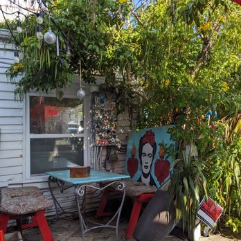 Frita's - Bench style seating under the tree - Cuban Near Me - Key West, Florida Frita's - Bench style seating under the tree - Cuban Near Me - Key West, Florida