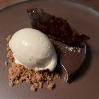 Rania - Chocolate tart with masala chai ice cream - Wine Bars Near Me - Washington, DC, District of Columbia Rania - Chocolate tart with masala chai ice cream - Wine Bars Near Me - Washington, DC, District of Columbia