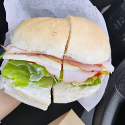 European Delicatessen - Ham sandwich. Lettuce, tomatoes, pickles, cheese, medium mustard and mayo. $8.85.