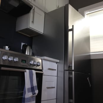 Pius Kitchen & Bath - White Shaker cabinets, Quarts counter and modern under-mount sink installed by Pius - Kitchen & Bath Near Me - Seattle, Washington