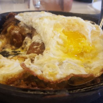 Smithy - Get this!!! Hash browns, shredded pork, cheese, gravey, overt easy egg. - Breakfast & Brunch Near Me - Dallas, Texas Smithy - Get this!!! Hash browns, shredded pork, cheese, gravey, overt easy egg. - Breakfast & Brunch Near Me - Dallas, Texas