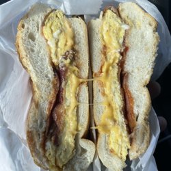 Greekish Rican Grill - Bacon egg and cheese with pepper and ketchup. Roll was toasted to perfection.