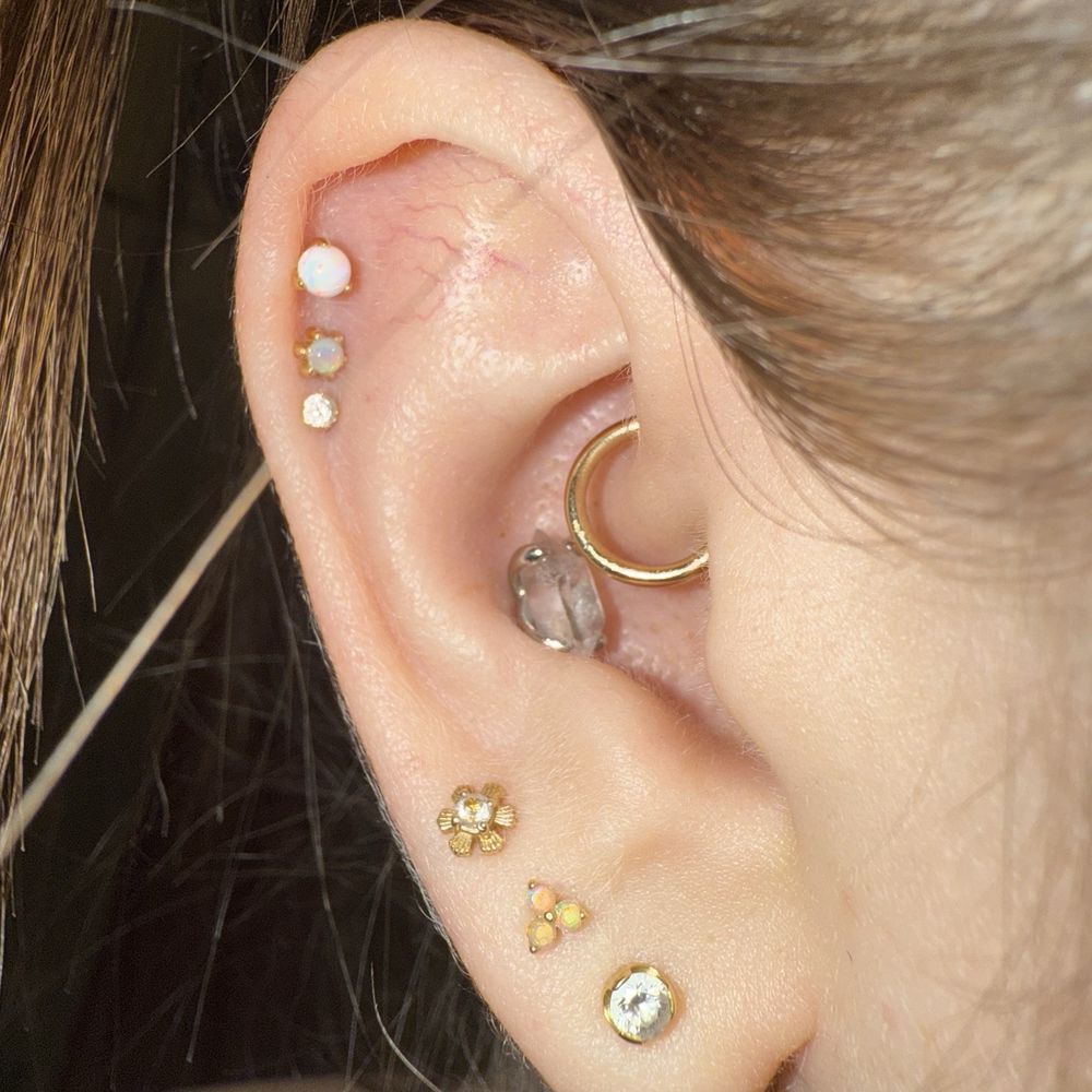 We swapped out my daith piercing from a chunky hinge ring from tether to a yellow gold seam ring from BVLA!!