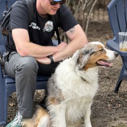 Pack Leaders ATL - Nathan is one of our certified dog walkers in Atlanta, spending some time with Auggie!