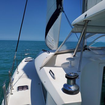 Restless Native Charters - Aria under full sail going out to meet the dolphins!  Yo ho ho and a margarita in hand! - Tours Near Me - Key West, Florida