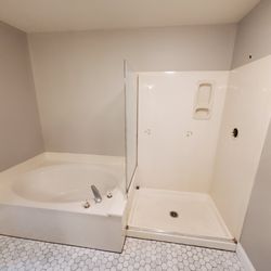Local Handyman - Old bathroom with basic builder finish