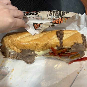 Geno's Steaks - Philly Cooper Sharp Cheesesteak - Sandwiches Near Me - Philadelphia, Pennsylvania Geno's Steaks - Philly Cooper Sharp Cheesesteak - Sandwiches Near Me - Philadelphia, Pennsylvania