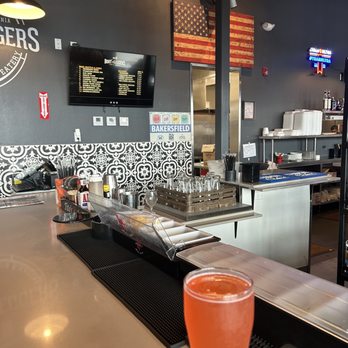 Bootleggers - a glass of beer sitting on a bar - Gastropubs Near Me - Bakersfield, California Bootleggers - a glass of beer sitting on a bar - Gastropubs Near Me - Bakersfield, California