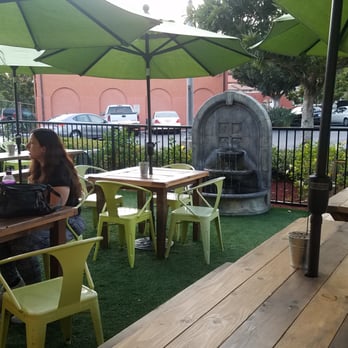 Green Tomato Grill - Unique outside patio. That's astro turf. - New American Near Me - Brea, California Green Tomato Grill - Unique outside patio. That's astro turf. - New American Near Me - Brea, California