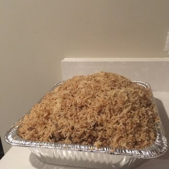 Wham's Cafe - a pan of cooked rice - African Near Me - Lowell, Massachusetts Wham's Cafe - a pan of cooked rice - African Near Me - Lowell, Massachusetts