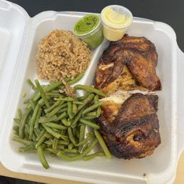 Half white chicken with green beans and fried rice.