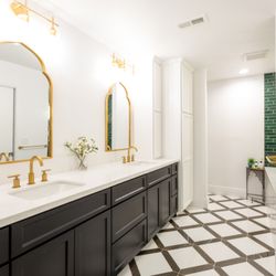 J & J Quality Construction - Custom cabinetry in a recent bathroom remodel.