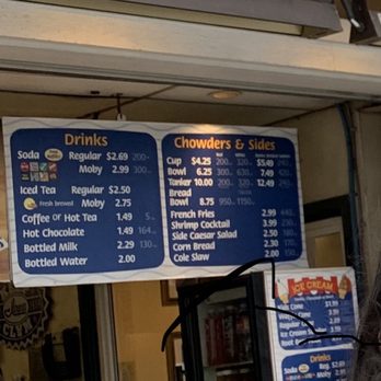 Ivar's Fish Bar - Food orders are placed at an outside counter and can be taken to go or eaten at a small indoor area, set with tables and chairs. - Seafood Near Me - Mukilteo, Washington