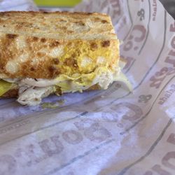 Sourdough & Co - Turkey sandwich covered in mustard