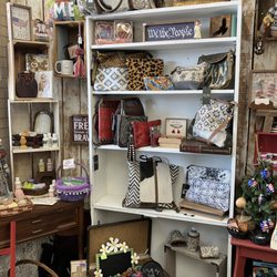 Craft Gallery - Several shops have purses and wallets of all styles and colors. Don't miss the women's jewelry!
