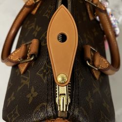 Louis Vuitton Topanga Plaza - Zipper pull repair and they severely damaged my bag handle
