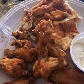 Kelly's Pub & Eatery - 10 wings I have on my plate next to my pizza. - American Near Me - Scranton, Pennsylvania