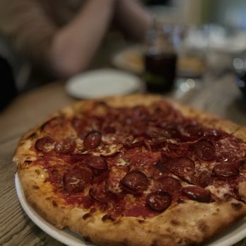 SOCO Kitchen + Bar - a pepperoni pizza on a plate - Bars Near Me - Toronto, Ontario