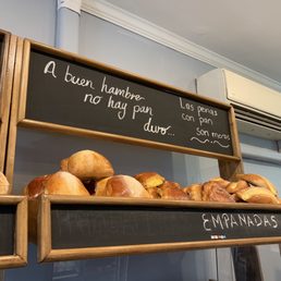 a bunch of breads on display a bunch of breads on display