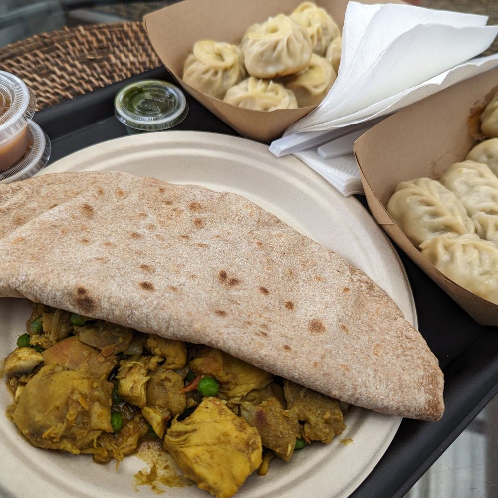 Top (Chicken Momo), Right (Veggie Momo), Chicken Curry with Roti Top (Chicken Momo), Right (Veggie Momo), Chicken Curry with Roti