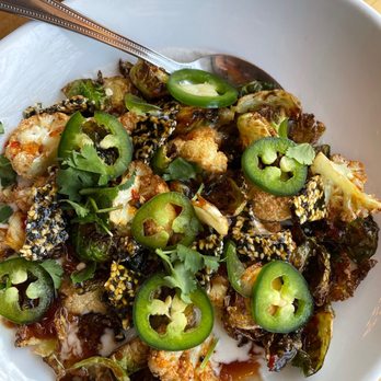 Poppycocks - Best item on the menu, coconut cauliflower - New American Near Me - Traverse City, Michigan