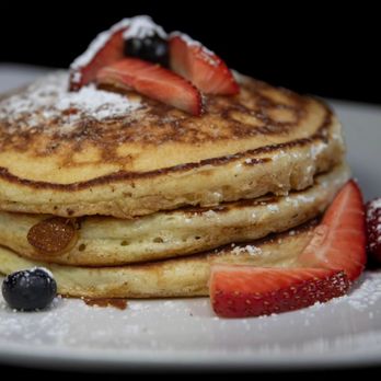 Midland Brew House - a stack of pancakes with strawberries and blueberries - Sports Bars Near Me - Saddle Brook, New Jersey Midland Brew House - a stack of pancakes with strawberries and blueberries - Sports Bars Near Me - Saddle Brook, New Jersey