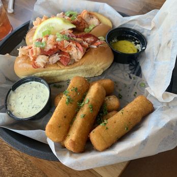 Tiki Docks Port Orange - Lobster roll with yucca fries - Seafood Near Me - Port Orange, Florida Tiki Docks Port Orange - Lobster roll with yucca fries - Seafood Near Me - Port Orange, Florida