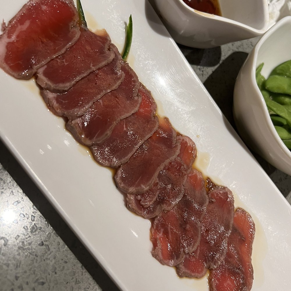 Sake Sushi - a plate of sliced meat and a bowl of green beans - Sushi Bars Near Me - Vaughan, Ontario Sake Sushi - a plate of sliced meat and a bowl of green beans - Sushi Bars Near Me - Vaughan, Ontario