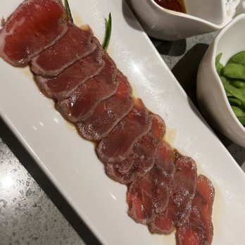 Sake Sushi - a plate of sliced meat and a bowl of green beans - Sushi Bars Near Me - Vaughan, Ontario Sake Sushi - a plate of sliced meat and a bowl of green beans - Sushi Bars Near Me - Vaughan, Ontario