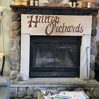 Hilltop Orchards - Hilltop offers several seating options, including by the fireplace. - Wine Tasting Room Near Me - Richmond, Massachusetts Hilltop Orchards - Hilltop offers several seating options, including by the fireplace. - Wine Tasting Room Near Me - Richmond, Massachusetts