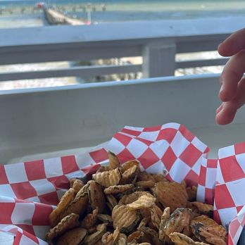 Jimmy's on the Pier - Pickle chips 8/10 served with tiny cup of ranch dressing - Seafood Near Me - Galveston, Texas Jimmy's on the Pier - Pickle chips 8/10 served with tiny cup of ranch dressing - Seafood Near Me - Galveston, Texas
