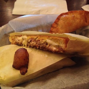 Havana Kitchen - My yummy Cuban sandwich and one fried plantain. Oh, and a chicken empanada. I'm caught red handed...I'm a hogsters! - Cuban Near Me - Temecula, California Havana Kitchen - My yummy Cuban sandwich and one fried plantain. Oh, and a chicken empanada. I'm caught red handed...I'm a hogsters! - Cuban Near Me - Temecula, California