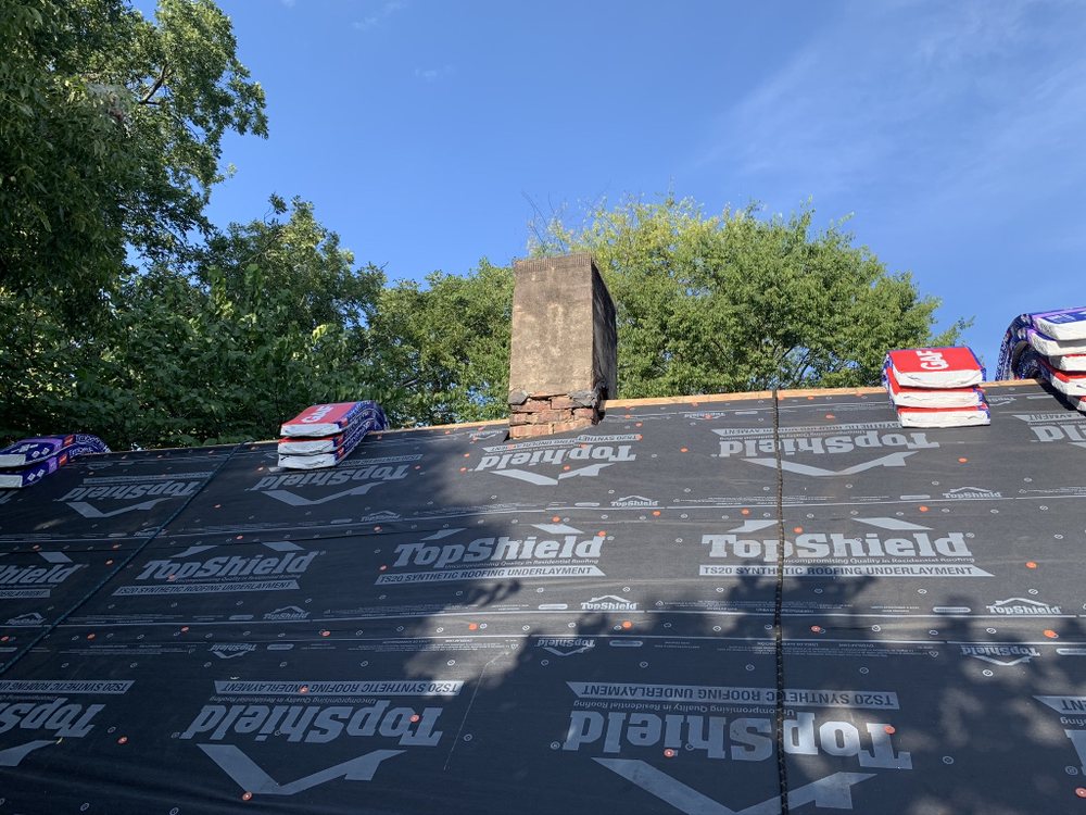 Slide of Noland Roofing