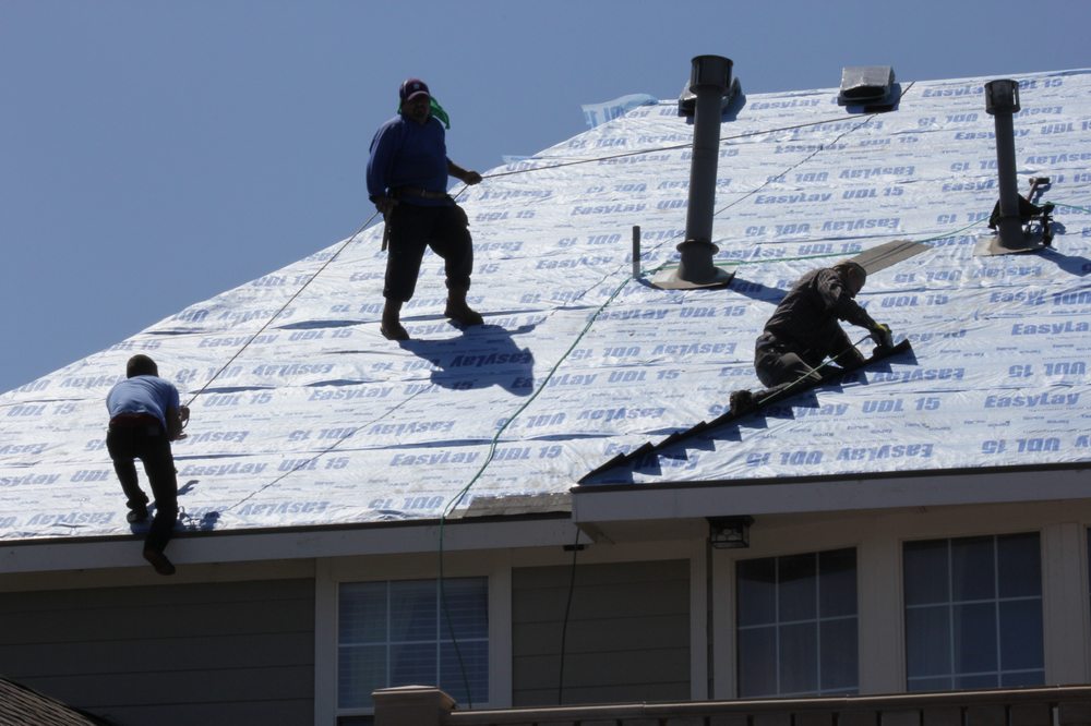 Slide of Roofing Giant