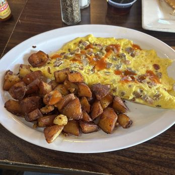 Sunshine Family Restaurant - Meat lovers with breakfast potato's. Ignore the hot sauce. - Waffles Near Me - Concord, North Carolina