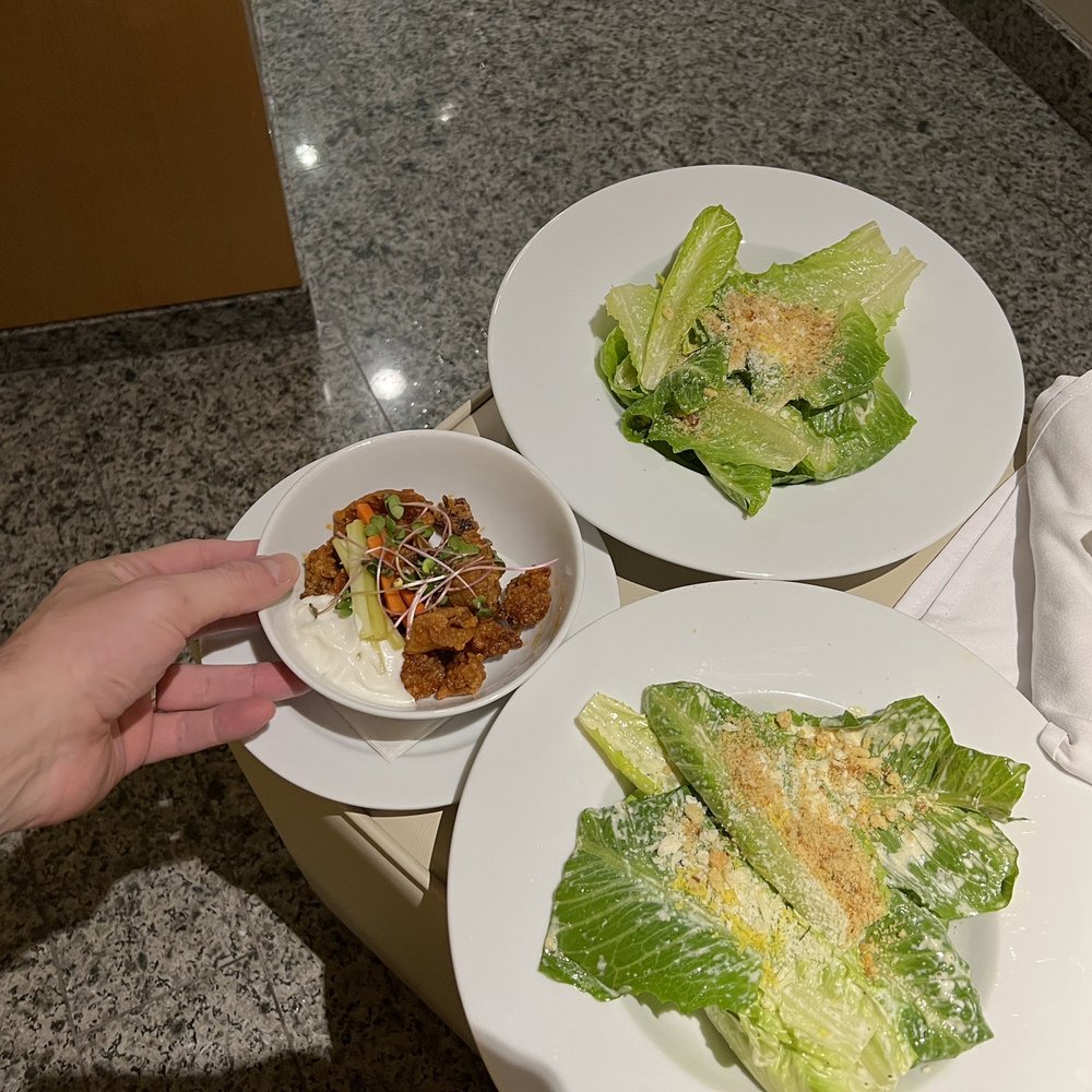 Sparkling Hill Resort & Spa - This is what a $60 dinner looks like. 2 Caesar salads (if you can call them that), and a calamari appetizer of 4 bites. - Resorts Near Me - Vernon, British Columbia Sparkling Hill Resort & Spa - This is what a $60 dinner looks like. 2 Caesar salads (if you can call them that), and a calamari appetizer of 4 bites. - Resorts Near Me - Vernon, British Columbia