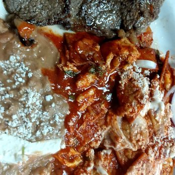 Yoli's Mexican Kitchen - Chilaquilles with egg scrambled together and carne asada. Started eating before pic - Mexican Near Me - Downey, California Yoli's Mexican Kitchen - Chilaquilles with egg scrambled together and carne asada. Started eating before pic - Mexican Near Me - Downey, California