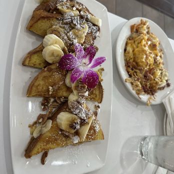 Eggsperts Cafe - Banana Pecan French Toast Smothered Bacon Cheddar Hash Browns. - Breakfast & Brunch Near Me - Orland Park, Illinois